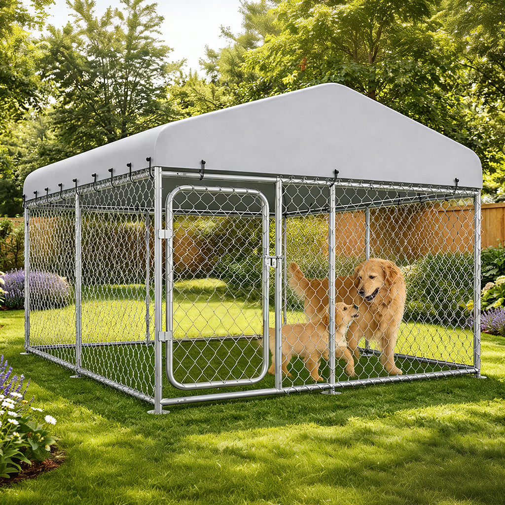 COMHOMA outdoor dog kennel with chain link panels all weather resistant roof and secure gate in a garden with a golden retriever
