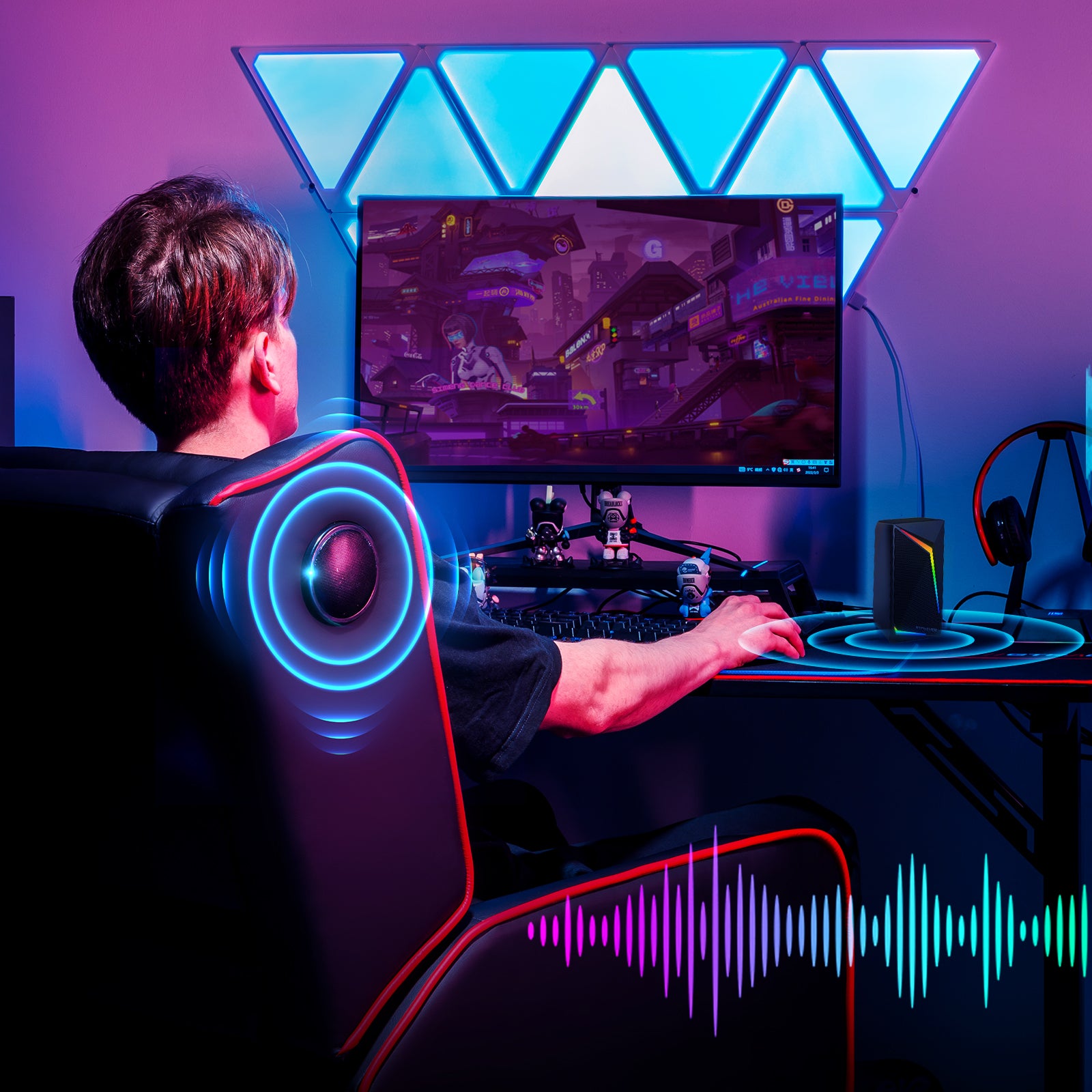 Person sitting in a black and red gaming recliner chair with blue speaker sound waves, playing a video game on a widescreen monitor in a modern gaming setup with blue triangular LED wall lights.