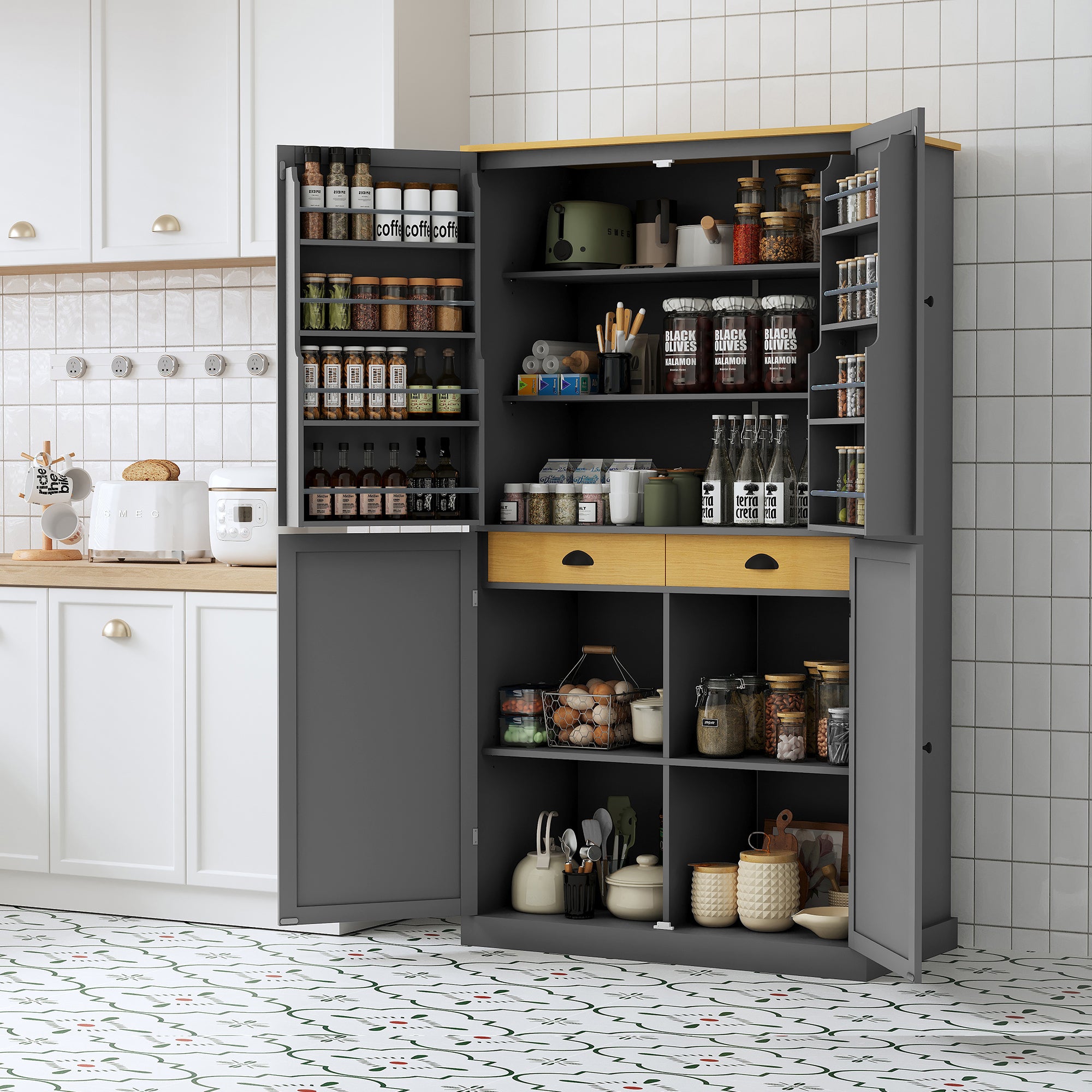 High freestanding kitchen pantry cupboard with open doors showing organized shelves stocked with jars, bottles, and kitchen essentials inside a modern kitchen with white cabinets and patterned floor tiles.
