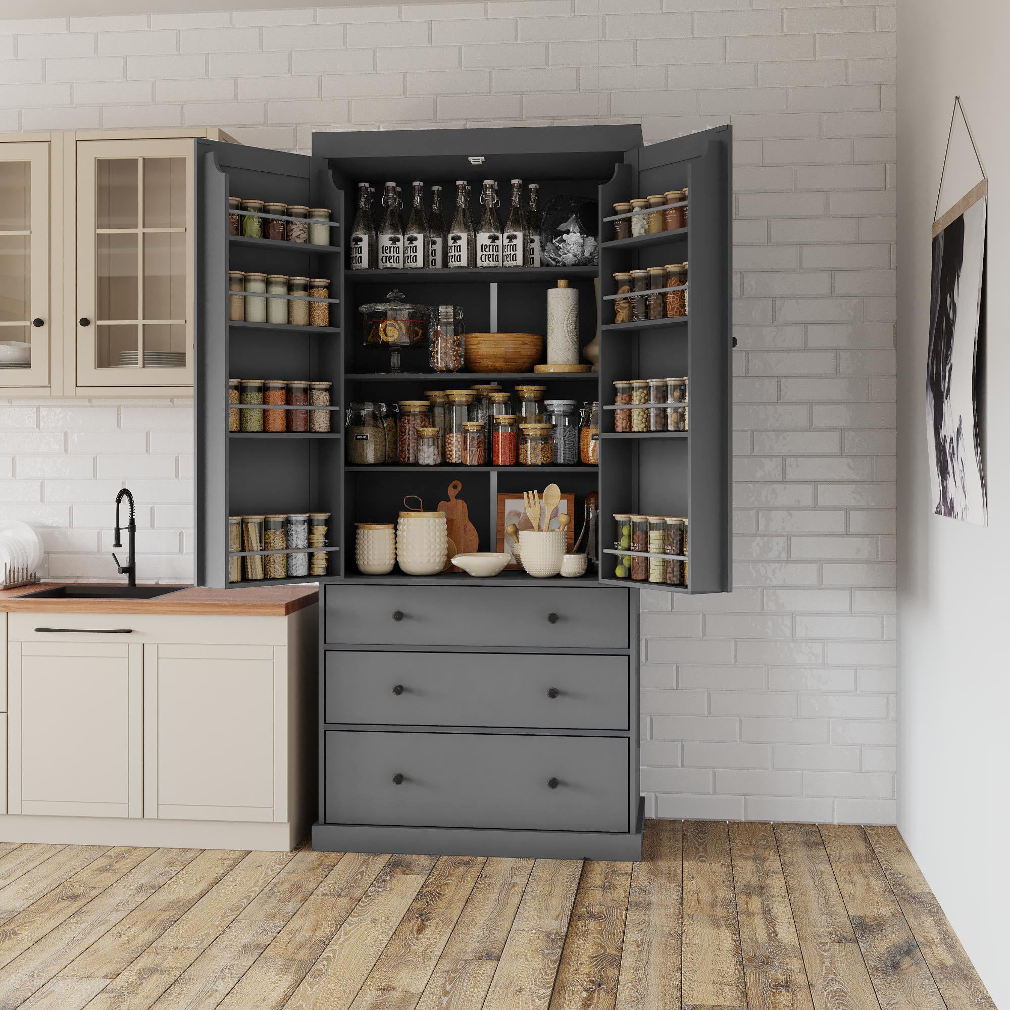 Freestanding tall kitchen storage cabinet with open doors showing organized spices, glass jars, bowls, and wooden utensils inside drawers and adjustable shelves in a modern farmhouse kitchen.
