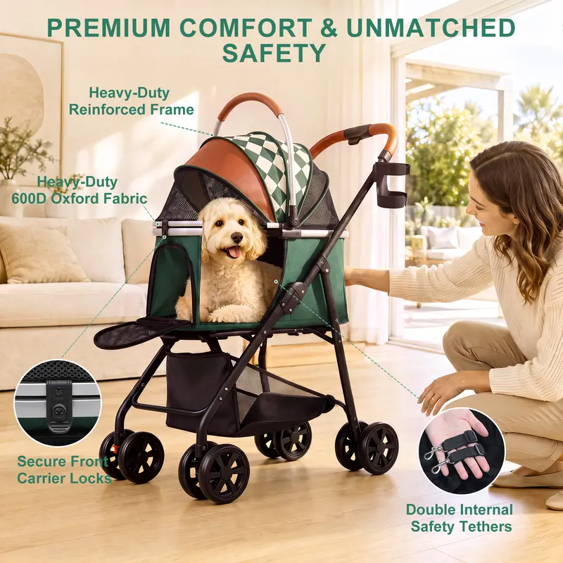 A small white dog sits inside a pet stroller with a woman kneeling beside it in a bright living room. The stroller has a green and white checkered canopy, brown leather-look trim, black frame, and mesh side panels.