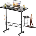 Black Adjustable standing desk with laptop, mouse, and phone on a white background