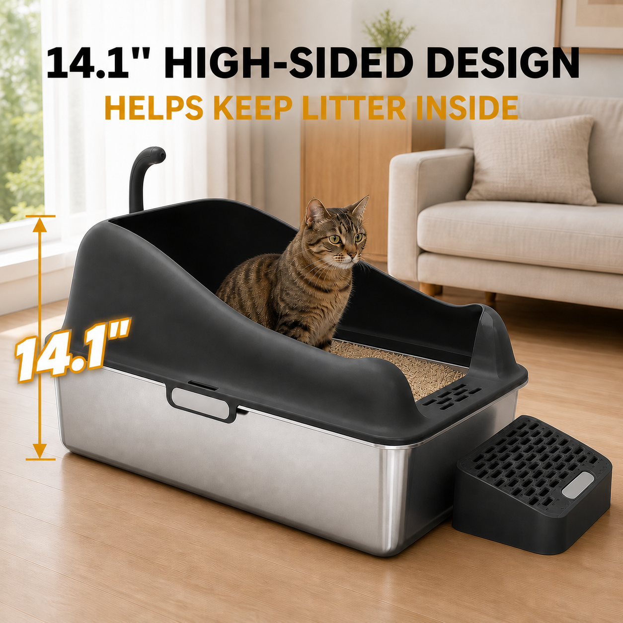 A high-sided cat litter box with a cat sitting inside, shown in a living room setting. The product has a black top and sides with a brushed silver metal base.