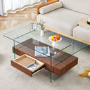 43.3 Inch Modern Two-Tier Coffee Table - Clear Tempered Glass and Dark Wood Grain, Multifunctional Storage Design.The bottom tier includes a drawer.Can be used as a coffee table,side table,etc.