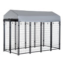 Outdoor dog playpen with black steel frame and lockable door, covered by a water-resistant gray canopy, designed for medium and large dogs.