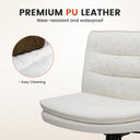 Close-up of a white office chair seat and backrest made with premium PU leather shown with water droplets, highlighting its wear-resistant, waterproof, and easy-cleaning features.