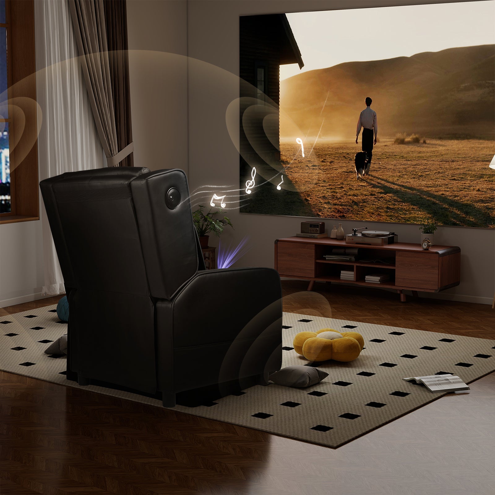 Black leather recliner chair positioned in a modern living room with a projector screen showing a person walking a dog at sunset and musical notes illustrating Bluetooth speaker sound features, part of office furniture and recliner chairs collections.