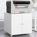 White metal mobile printer stand with storage cabinet featuring two doors and wooden knobs, supporting a black and white printer in a modern office setting.