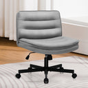 Gray ergonomic armless office chair with adjustable height, low back support, and black caster wheels on a striped rug in a bright room with wooden floors and white curtains.