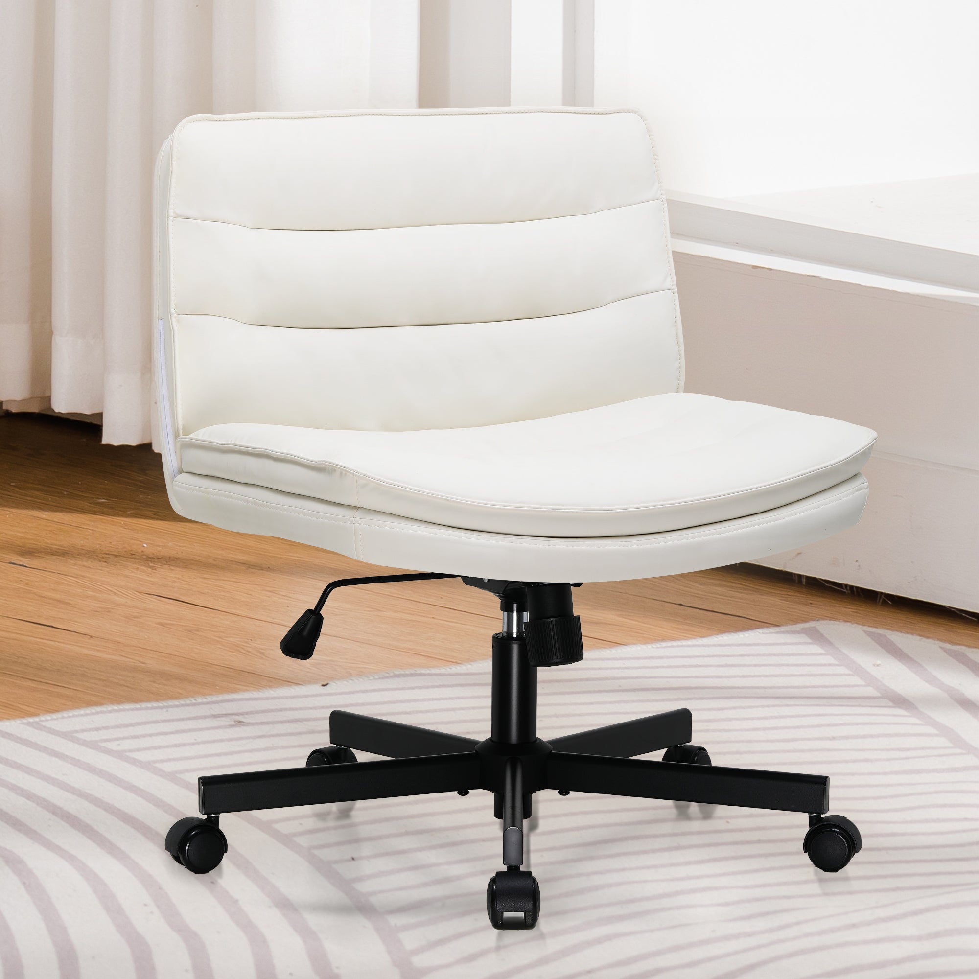 White armless adjustable office chair with padded seat and backrest on black caster wheels, placed on a patterned rug near a wooden floor and white walls.