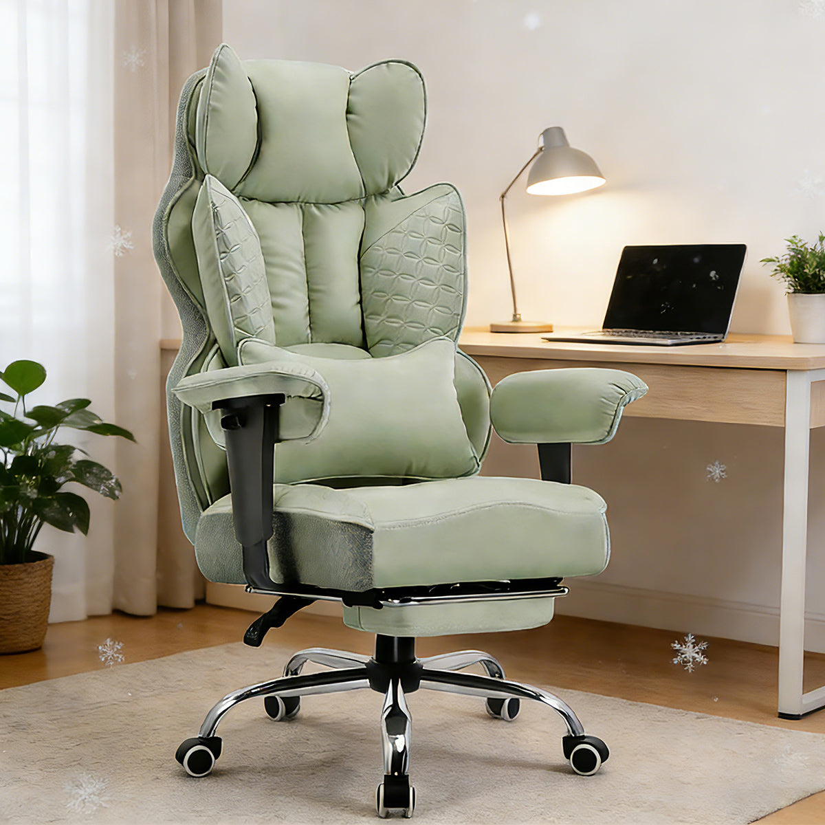 Green ergonomic office chair with adjustable armrests, padded headrest, and lumbar pillow in a home office setting with desk, laptop, lamp, and plant, showcasing a comfortable workspace.