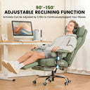 90°-150° Adjustable Reclining Function Armrests Can Be Adjusted by 3.15in to Continuously Support Your Elbows showing a person reclining on a green ergonomic office chair with footrest in a home office setting with wood floor and desk with computer and books.