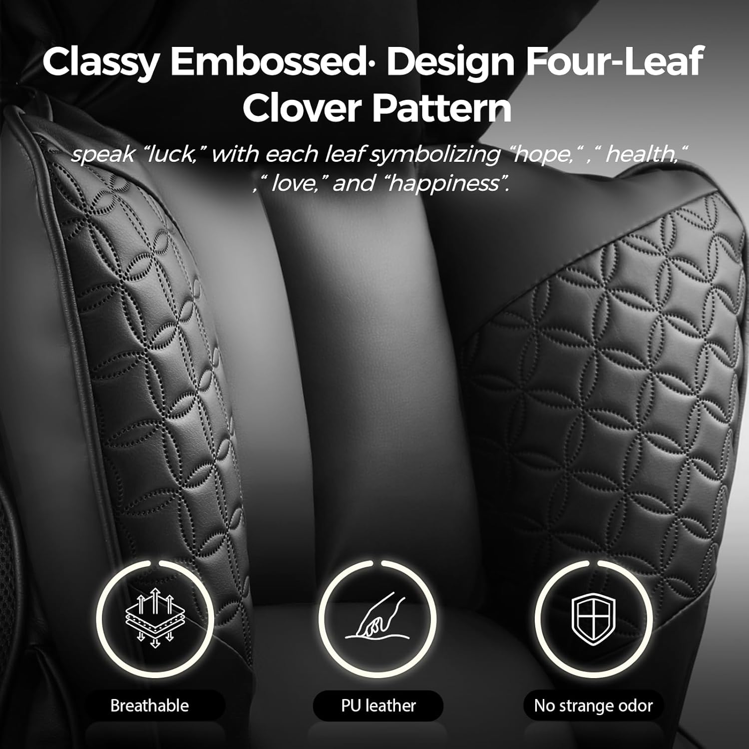 Black quilted seat covers with embossed four-leaf clover pattern on a dark background