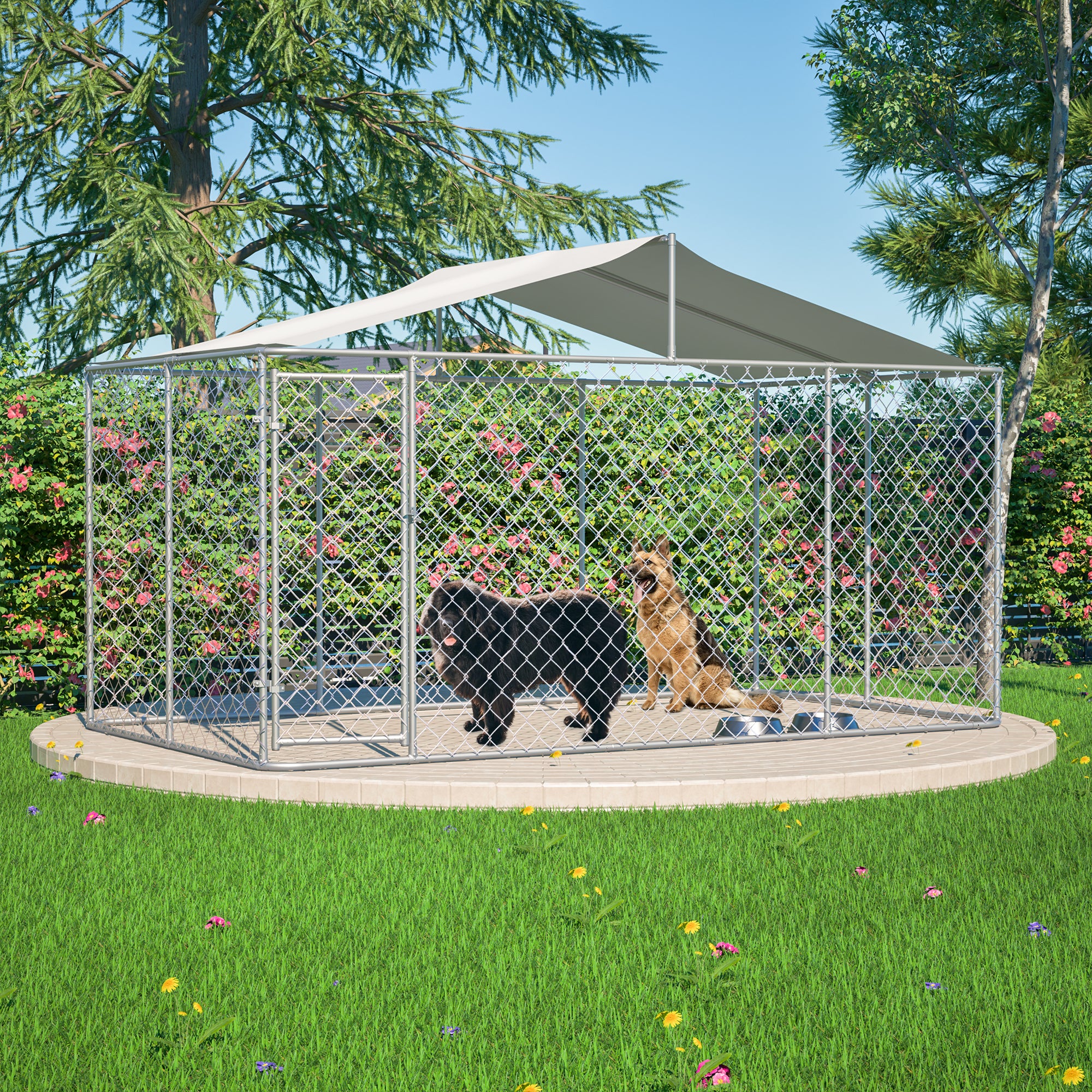 Outdoor galvanized chain link dog kennel with waterproof cover and secure lock, containing two dogs inside on a green lawn surrounded by trees and bushes.